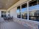 Deck area has outdoor seating, wood decking, and backyard views at 4971 Bross Pl, Broomfield, CO 80023