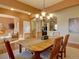 Cozy formal dining room with views into the living room at 4971 Bross Pl, Broomfield, CO 80023