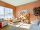 Cozy sitting room featuring large bright windows at 4971 Bross Pl, Broomfield, CO 80023