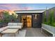 Relaxing rooftop deck features outdoor seating, privacy landscaping, and room to dine outdoors at 2242 W 34Th Ave, Denver, CO 80211