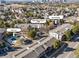 Aerial view of the community showing the location of the pool, guest parking, and building address at 6435 S Dayton St # 103, Englewood, CO 80111