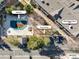Aerial view of community amenities, including the pool, guest parking, and building #103 at 6435 S Dayton St # 103, Englewood, CO 80111