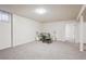 Cozy basement seating area with a small table and lamps for a calming atmosphere at 1687 S Field Ct, Lakewood, CO 80232