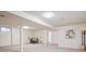 Large open basement space with carpet floors and white walls, ready for customization and finishing touches at 1687 S Field Ct, Lakewood, CO 80232