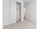 Bedroom featuring a closet with sliding doors at 45928 Gentry Ave, Bennett, CO 80102