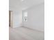 Bright bedroom featuring neutral carpet and a window providing natural light at 45928 Gentry Ave, Bennett, CO 80102
