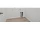 The laundry area with hookups and base trim, offering a functional space at 45928 Gentry Ave, Bennett, CO 80102