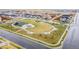 An aerial view of a neighborhood park complete with playground and gazebo at 17801 E 95Th Pl, Commerce City, CO 80022