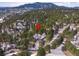 Property location shown with surrounding homes and landscape at 3028 Olympia Cir, Evergreen, CO 80439