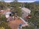 Aerial view of house and surrounding area at 3028 Olympia Cir, Evergreen, CO 80439