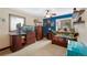 bedroom with mountain view and built-in shelving at 3028 Olympia Cir, Evergreen, CO 80439