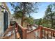 Deck with mountain views and stairs leading down at 3028 Olympia Cir, Evergreen, CO 80439