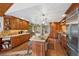 Spacious kitchen featuring granite countertops and stainless steel appliances at 3028 Olympia Cir, Evergreen, CO 80439