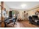 Home office with two work stations and plenty of natural light at 3028 Olympia Cir, Evergreen, CO 80439