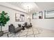 Bright living room with modern decor and statement lighting at 1440 S Dahlia St, Denver, CO 80222