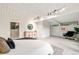 Bright main bedroom features carpeted floors and ensuite bath at 1440 S Dahlia St, Denver, CO 80222