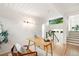 Bright office space with hardwood floors and staircase to an upper level at 1440 S Dahlia St, Denver, CO 80222