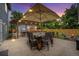 Outdoor patio featuring an outdoor dining area and built-in BBQ, perfect for entertaining at 14887 W 49Th Pl, Golden, CO 80403