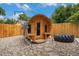 Backyard featuring a unique barrel sauna, providing a relaxing and therapeutic experience at 14887 W 49Th Pl, Golden, CO 80403