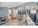 The delightful Bedroom features custom wall art, crib and play tent at 14887 W 49Th Pl, Golden, CO 80403
