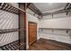 Walk-in closet with custom wood shelving and drawers maximizing storage at 14887 W 49Th Pl, Golden, CO 80403