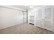 Bedroom with neutral carpet and built in shelves and storage at 3036 Birch St, Denver, CO 80207