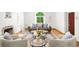 Bright living room with a fireplace and comfortable seating arrangement at 3036 Birch St, Denver, CO 80207