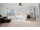 Bright main bedroom with lots of natural light, neutral walls, and a ceiling fan at 6475 S Newcastle Way, Aurora, CO 80016
