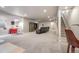 Finished basement featuring a rec area, theater seating and wet bar for entertaining at 2187 Pineywoods St, Mead, CO 80542