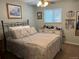 Comfortable bedroom showcases a cozy bed and stylish dresser, creating a relaxing retreat at 1829 S Lee St # C, Lakewood, CO 80232