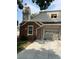 Exterior view of home featuring classic brick and siding design at 1829 S Lee St # C, Lakewood, CO 80232