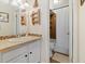 Charming bathroom with a vanity, decorative mirror, and a tiled shower/tub combination at 1390 N Emerson St # 406, Denver, CO 80218