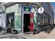 Charming neighborhood restaurant with outdoor seating and a welcoming entrance on a sunny day at 1390 N Emerson St # 406, Denver, CO 80218