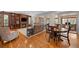 Living room with hardwood floors, fireplace, and built-in shelving at 588 Tolland Ct, Castle Rock, CO 80108