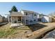 Fenced backyard with covered patio and detached shed at 1781 E 97Th Ave, Thornton, CO 80229