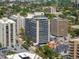 A birds eye view showcases the building's rooftop pool amenity and surrounding urban landscape at 790 N Washington St # 1210, Denver, CO 80203