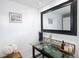 Stylish bathroom with a vessel sink, granite countertops, and decorative artwork at 790 N Washington St # 1210, Denver, CO 80203