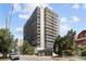 Beautiful apartment building exterior surrounded by lush landscaping at 790 N Washington St # 1210, Denver, CO 80203