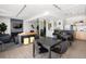 Resident lounge area featuring a full kitchen, TV, tables and seating for gathering and entertaining at 790 N Washington St # 1210, Denver, CO 80203