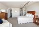 Spacious bedroom with dresser and sitting area at 790 N Washington St # 1210, Denver, CO 80203
