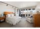Bedroom with a balcony view and cozy furniture arrangement at 790 N Washington St # 1210, Denver, CO 80203
