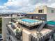 Enjoy the community rooftop pool with comfortable lounge seating and stunning city views at 790 N Washington St # 1210, Denver, CO 80203