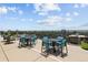 Spacious rooftop lounge area with seating, dining, and stunning city views on the horizon at 790 N Washington St # 1210, Denver, CO 80203
