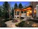 Backyard includes an outdoor gazebo and a cozy patio with a charming water fountain at 17 Polo Club Dr, Denver, CO 80209