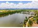 Scenic aerial view of the community lakes and walking paths at 301 Widgeon Ln, Longmont, CO 80503