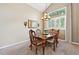 Formal dining room with traditional wood furniture, perfect for Gathering meals at 301 Widgeon Ln, Longmont, CO 80503