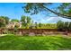 Beautiful backyard featuring a charming garden with raised beds, ideal for growing your own vegetables and flowers at 301 Widgeon Ln, Longmont, CO 80503