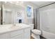 Classic bathroom with white vanity, toilet, and shower/tub combination at 104 Willowick Cir, Highlands Ranch, CO 80129