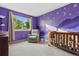 Unique ' bedroom with purple walls and a star pattern, with natural lighting at 104 Willowick Cir, Highlands Ranch, CO 80129