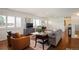 Bright, open living space features hardwood floors and a charming fireplace at 986 S Jersey St, Denver, CO 80224